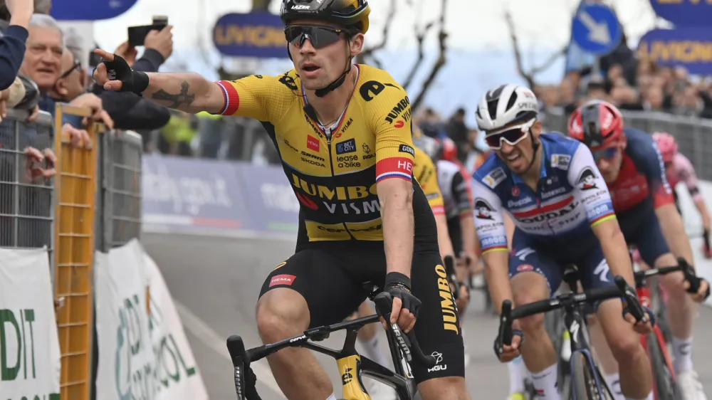 Slovenia's Primoz Roglic celebrates winning the fourth stage of the Tirreno Adriatico cycling race from Greccio to Tortoreto, Italy, Thursday, March 9, 2023. ((Gian Mattia D'Alberto/LaPresse via AP)