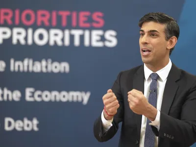 Britain's Prime Minister Rishi Sunak gestures as he attends a Q&A session during a Connect event at a Boxing Club in Chelmsford, Essex, England, Monday, March 27, 2023.(AP Photo/Kin Cheung, pool)