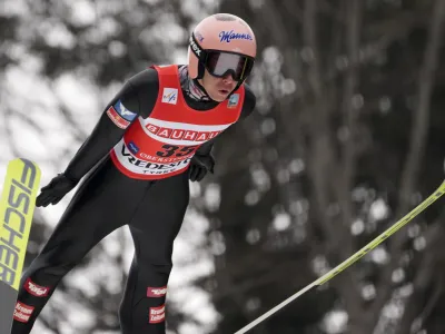Austria's Stefan Kraft competes during trial round of the FIS Ski Flying World Cup in Oberstdorf, Germany, Saturday, March 19, 2022. (AP Photo/Matthias Schrader)