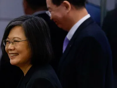 Taiwanese President Tsai Ing-wen smiles towards the media before her departure to New York to start her trip to Guatemala and Belize at Taoyuan International Airport in Taoyuan, Taiwan March 29, 2023. REUTERS/Ann Wang