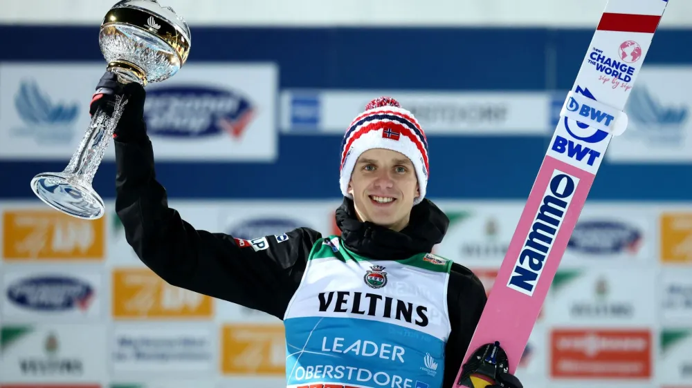Ski Jumping - Four Hills Tournament - Oberstdorf, Germany - December 29, 2022 Norway's Halvor Egner Granerud celebrates on the podium after winning the men's HS137 REUTERS/Lisi Niesner
