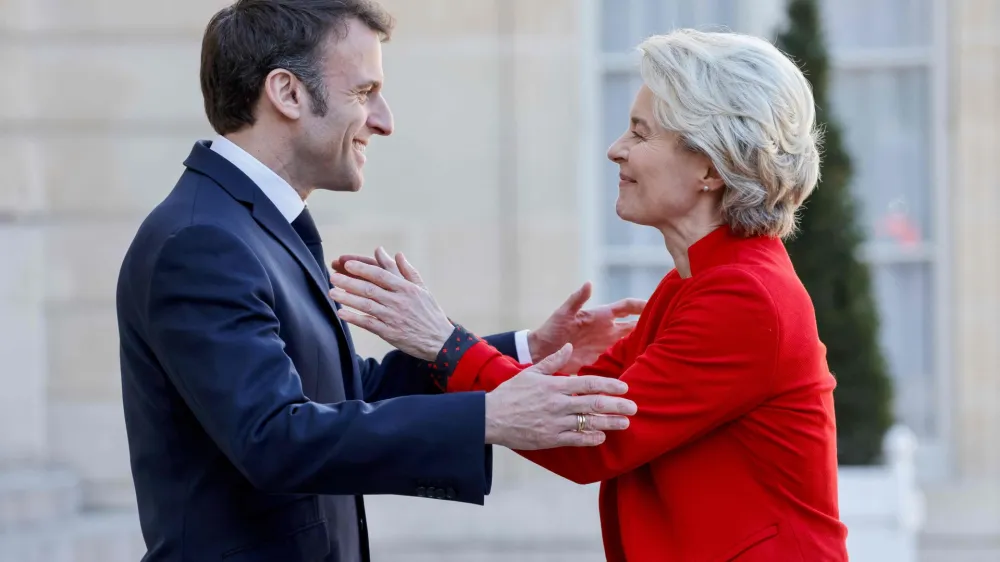 03 April 2023, France, Paris: French President Emmanuel Macron (L) welcomes European Commission President Ursula von der Leyen prior to their meeting at the Elysee Palace. Photo: Ludovic Marin/AFP/dpa