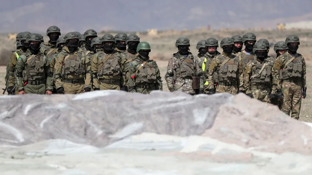 Service members of Kazakhstan's airborne assault forces take part in military exercises at a target range in the Almaty region, Kazakhstan, April 5, 2023. REUTERS/Pavel Mikheyev