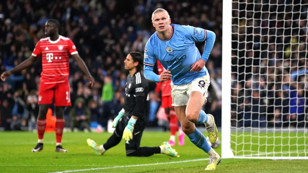 11 April 2023, United Kingdom, Manchester: Manchester City's Erling Haaland celebrates scoring their side's third goal of the game during the UEFA Champions League quarter final first leg soccer match between Manchester City and Bayern Munich at Etihad Stadium. Photo: Tim Goode/PA Wire/dpa