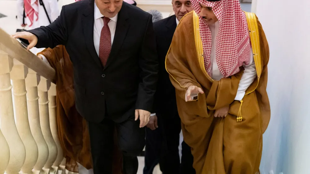 Saudi Foreign Minister Prince Faisal bin Farhan bin Abdullah meets with Syrian Minister of Foreign Affairs and Expatriates Faisal Mekdad in Jeddah, Saudi Arabia, April 12, 2023. Saudi Press Agency/Handout via REUTERS ATTENTION EDITORS - THIS PICTURE WAS PROVIDED BY A THIRD PARTY