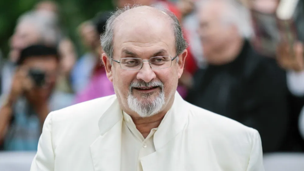 FILED - 09 September 2012, Canada, Toronto: Writer Salman Rushdie arrives to the "Midnight's Children" Premiere during the 2012 Toronto International Film Festival at Roy Thomson Hall. Rushdie was rushed to hospital for surgery after being attacked during a literary event in New York state on Friday. Photo: Christopher Drost/SHIFT digital via ZUMAPRESS/dpa