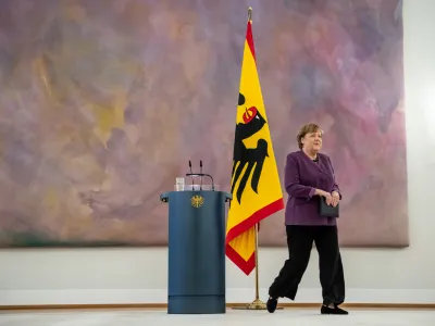 17 April 2023, Berlin: Angela Merkel, former German Chancellor, walks off the podium after being awarded the Grand Cross of the Order of Merit of the Federal Republic of Germany in Special Execution at Bellevue Palace. The order was previously awarded only to Chancellors Kohl and Adenauer. Photo: Michael Kappeler/dpa