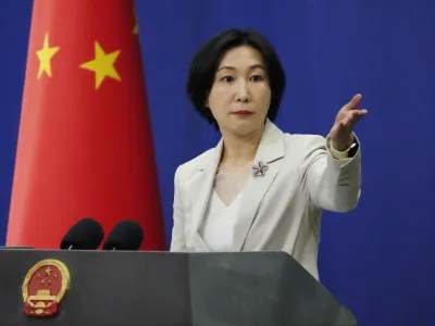 Chinese Foreign Ministry spokesperson Mao Ning gestures during a daily briefing at the Ministry of Foreign Affairs office in Beijing, Monday, April 24, 2023. The Chinese government said Monday it respects the sovereignty of former Soviet Union republics after Beijing's ambassador to France caused an uproar in Europe by saying they aren't sovereign nations. (AP Photo/Andy Wong)