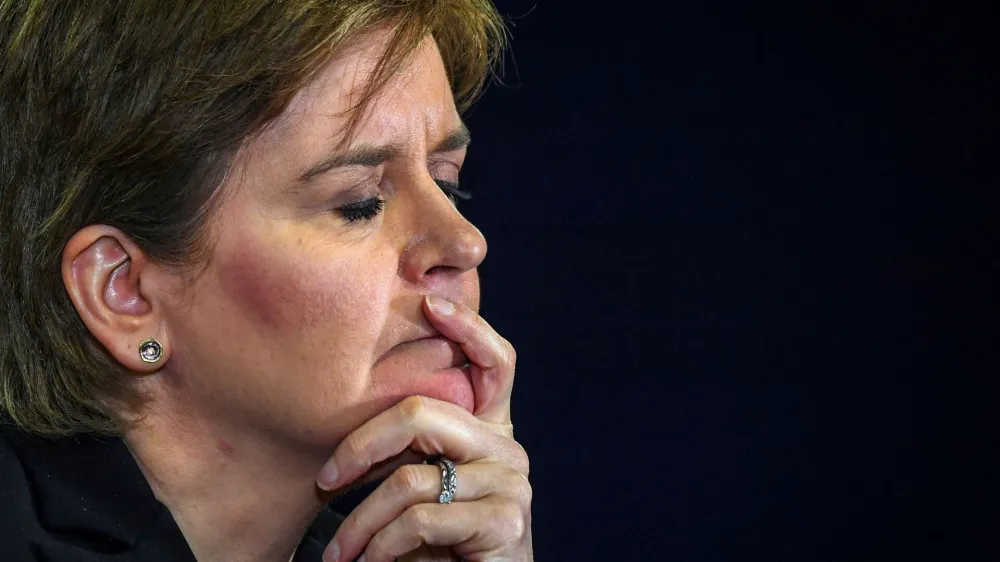 FILE PHOTO: Scotland's First Minister Nicola Sturgeon reacts as she addresses the media during a press conference at St Andrews House, Edinburgh, Scotland, Britain on January 23, 2023. ANDY BUCHANAN/Pool via REUTERS/File Photo