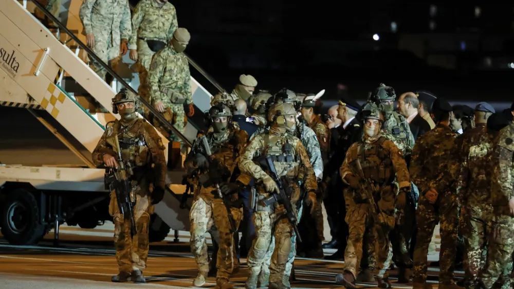 24 April 2023, Italy, Rome: Military Forces stand as Italian citizens disembark an Air Force plane carrying Italian citizens evacuated from Sudan landed at the Ciampino Military airport. Photo: Domenico Cippitelli/LPS via ZUMA Press Wire/dpa