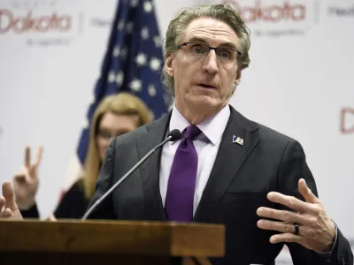 FILE - North Dakota Gov. Doug Burgum speaks at the state Capitol on April 10, 2020, in Bismarck, N.D. Burgum signed an abortion ban at six weeks of pregnancy — even in cases of rape or incest — into law on Monday, April 24, 2023. (Mike McCleary/The Bismarck Tribune via AP, File)