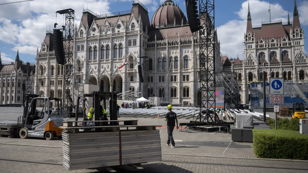 Preparations at Kossuth Lajos' Square where Pope Francis will lead a Holy Mass, in Budapest Thursday, April 27, 2023 during his visit to Hungary. Members of the Catholic community expect the pope's visit to be a celebration of Christian unity, and that a divergence of perspectives will not play a central role in Francis' visit to Hungary. (AP Photo/Denes Erdos)