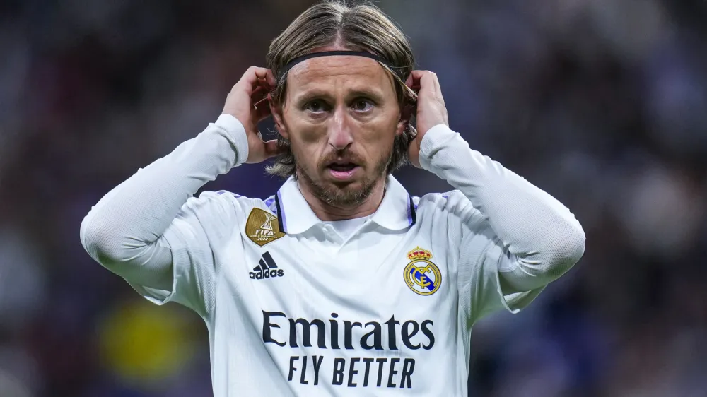 FILE - Real Madrid's Luka Modric gestures during Spanish La Liga soccer match between Real Madrid and Celta Vigo at the Santiago Bernabeu stadium in Madrid, Spain, Saturday, April 22, 2023. Real Madrid midfielder Luka Modric has injured his left thigh barely a week ahead of the Copa del Rey final and the Champions League semifinals, the Spanish club said Friday, April 28, 2023. (AP Photo/Manu Fernandez, File)