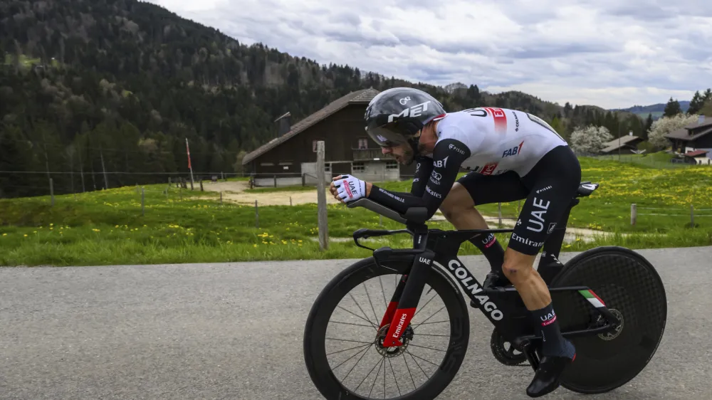 Britain's Adam Yates pedals during the third stage, a 18,75 km race against the clock around Chatel-Saint-Denis at the 76th Tour de Romandie UCI World Tour Cycling race, in Chatel-Saint-Denis, Switzerland, Friday, April 28, 2023. (Jean-Christophe Bott/Keystone via AP)