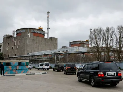 FILE PHOTO: A motorcade transporting the International Atomic Energy Agency (IAEA) expert mission, escorted by the Russian military, arrives at the Zaporizhzhia Nuclear Power Plant in the course of Russia-Ukraine conflict outside Enerhodar in the Zaporizhzhia region, Russian-controlled Ukraine, March 29, 2023. REUTERS/Alexander Ermochenko//File Photo