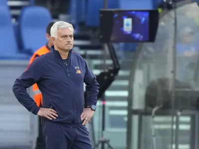 Roma's head coach Jose Mourinho follows the game during a Serie A soccer match between Roma and Inter Milan, at Rome's Olympic Stadium, Saturday, May 6, 2023. (AP Photo/Andrew Medichini)