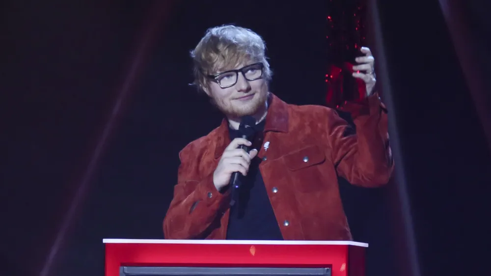 Ed Sheeran receives the Global Success Award at the Brit Awards 2018 in London, Wednesday, Feb. 21, 2018. (Photo by Joel C Ryan/Invision/AP)