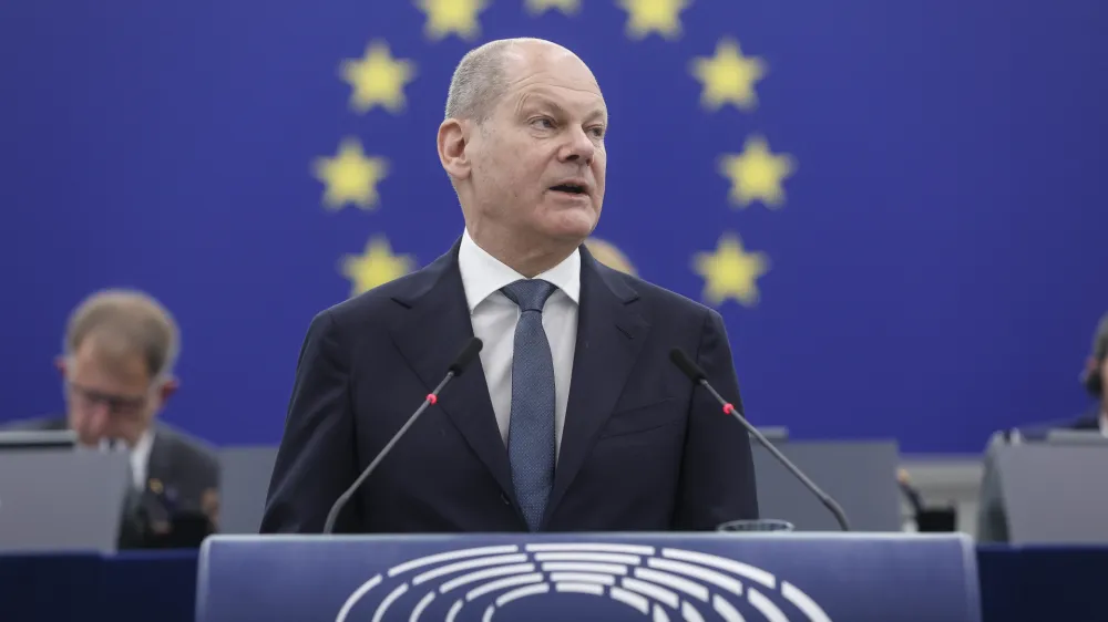 German Chancellor Olaf Scholz delivers his speech during a debate about Europe, Tuesday, may 9, 2023 at the European Parliament in Strasbourg, eastern France. (AP Photo/Jean-Francois Badias)