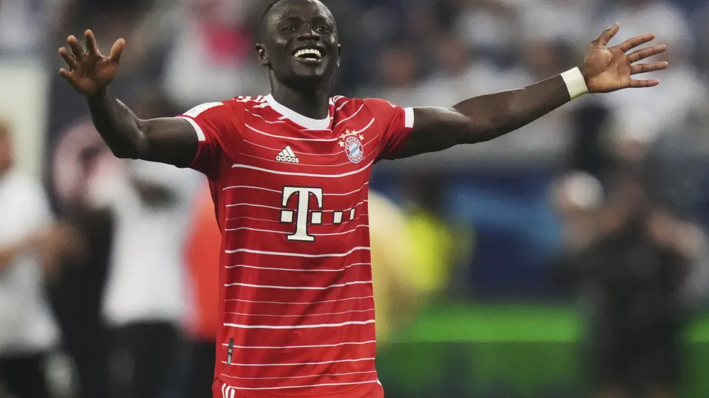 Bayern's Sadio Mane celebrates after the German Bundesliga soccer match between Eintracht Frankfurt and Bayern Munich in Frankfurt, Germany, Friday, Aug. 5, 2022. (AP Photo/Matthias Schrader)