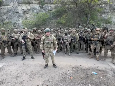 FILE PHOTO: Founder of Wagner private mercenary group Yevgeny Prigozhin makes a statement as he stand next to Wagner fighters in an undisclosed location in the course of Russia-Ukraine conflict, in this still image taken from video released May 5, 2023. Press service of "Concord"/Handout via REUTERS ATTENTION EDITORS - THIS IMAGE WAS PROVIDED BY A THIRD PARTY. NO RESALES. NO ARCHIVES. MANDATORY CREDIT./File Photo