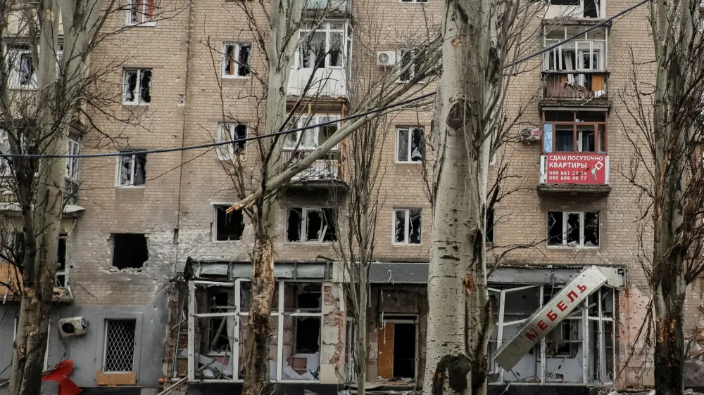 A general view shows a building damaged by a Russian military strike, amid Russia's attack on Ukraine, in the front line city of Bakhmut, in Donetsk region, Ukraine February 25, 2023. Radio Free Europe/Radio Liberty/Serhii Nuzhnenko via REUTERS THIS IMAGE HAS BEEN SUPPLIED BY A THIRD PARTY.