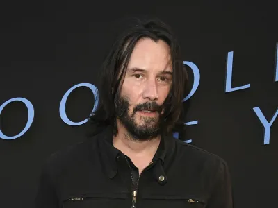 Keanu Reeves poses at a special screening of the Amazon Prime series "Too Old to Die Young" at the Vista Theatre, Monday, June 10, 2019, in Los Angeles. (Photo by Chris Pizzello/Invision/AP)