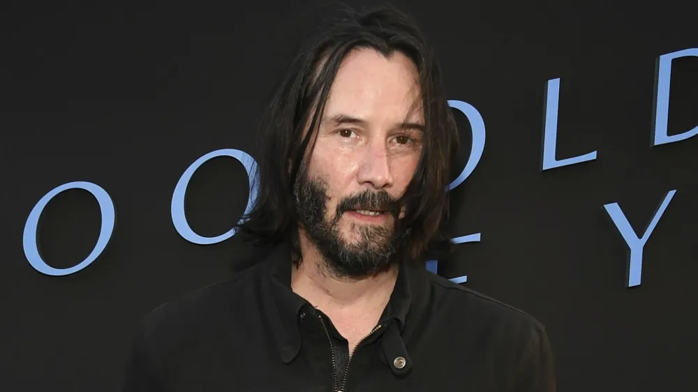 Keanu Reeves poses at a special screening of the Amazon Prime series "Too Old to Die Young" at the Vista Theatre, Monday, June 10, 2019, in Los Angeles. (Photo by Chris Pizzello/Invision/AP)