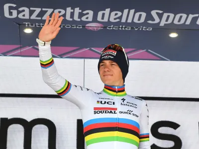 Cycling - Giro d'Italia - Stage 9 - Savignano sul Rubicone to Cesena Tudor ITT - Italy - May 14, 2023 Soudal – QuickStep's Remco Evenepoel celebrates wearing the maglia bianca jersey REUTERS/Jennifer Lorenzini