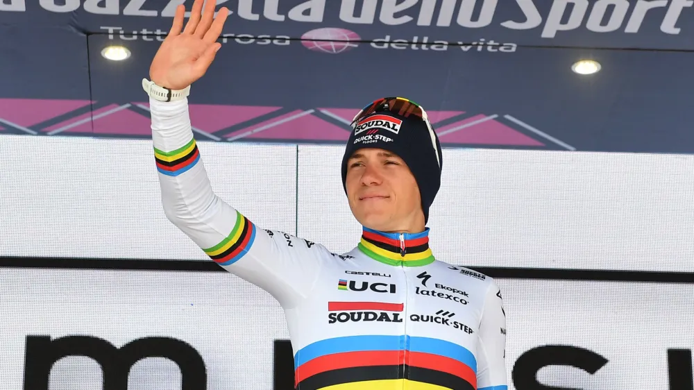 Cycling - Giro d'Italia - Stage 9 - Savignano sul Rubicone to Cesena Tudor ITT - Italy - May 14, 2023 Soudal – QuickStep's Remco Evenepoel celebrates wearing the maglia bianca jersey REUTERS/Jennifer Lorenzini