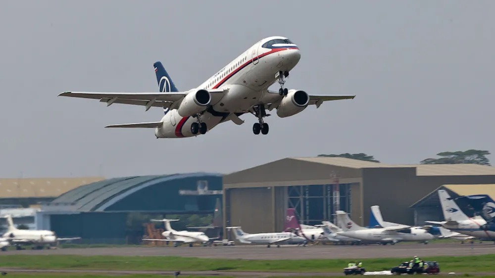 In this photo released by Sergey Dolya, a Sukhoi Superjet-100 takes off from Halim Perdanakusuma airport in Jakarta, Indonesia, Wednesday, May 9, 2012 on it's second demonstration flight of the day. The Russian-made Sukhoi jet plane with 50 people on board, including eight Russians and an American, has gone missing during this flight near Jakarta, Indonesian government officials said Wednesday.(AP Photo/Sergey Dolya) NO SALES