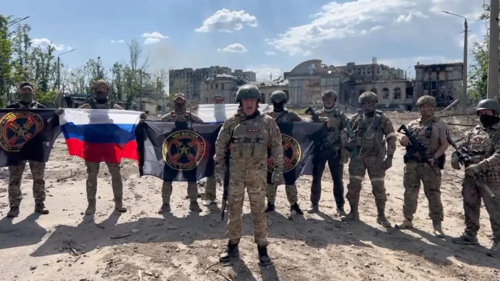 Founder of Wagner private mercenary group Yevgeny Prigozhin makes a statement as he stand next to Wagner fighters in the course of Russia-Ukraine conflict in Bakhmut, Ukraine, in this still image taken from video released May 20, 2023. Press service of "Concord"/Handout via REUTERS ATTENTION EDITORS - THIS IMAGE WAS PROVIDED BY A THIRD PARTY. NO RESALES. NO ARCHIVES. MANDATORY CREDIT.