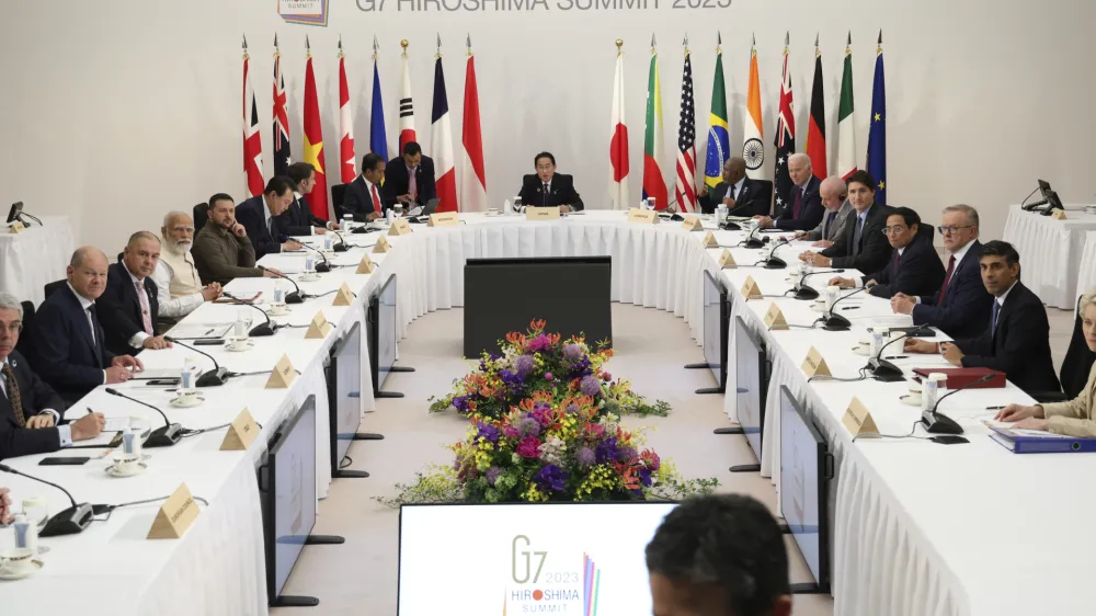 Leaders of the Group of Seven nations attend a session with other guest countries including Ukraine's Volodymyr Zelenskyy in Hiroshima, western Japan, Sunday, May 21, 2023. Monetary Fund. (Japan Pool via AP)