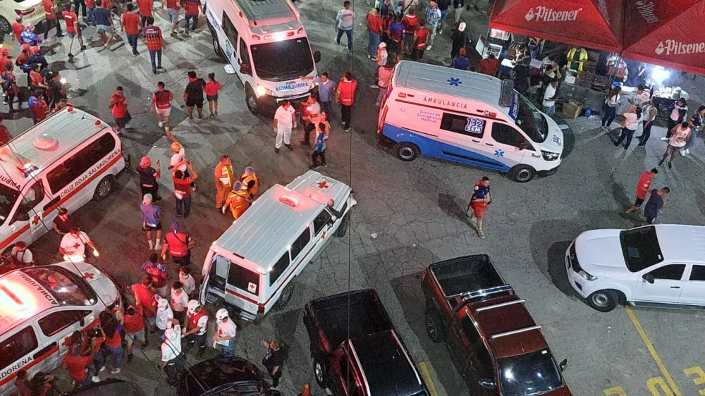 20 May 2023, El Salvador, San Salvador: Ambulances stand outside Cuscatlan Stadium after a stampede during the soccer match between FC Alianza and CD FAS in El Salvador. At least nine people died and some 100 were injured. Photo: -/La Nacion via ZUMA Press/dpa