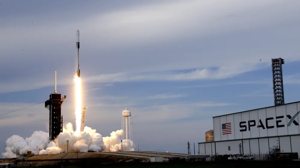 A SpaceX Falcon 9 rocket, with the Dragon capsule and a crew of four private astronauts, lifts off from Pad 39A at the Kennedy Space Center in Cape Canaveral, Fla., Sunday, May 21, 2023. (AP Photo/John Raoux)