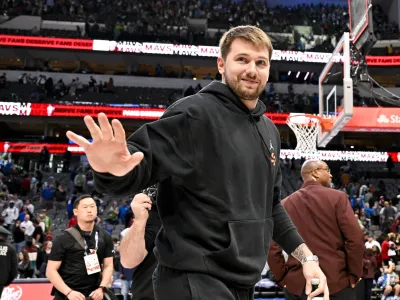 Apr 7, 2023; Dallas, Texas, USA; Dallas Mavericks guard Luka Doncic (77) waves to the crowd as he walks off the court after the Mavericks loss to the Chicago Bulls at the American Airlines Center. Mandatory Credit: Jerome Miron-USA TODAY Sports