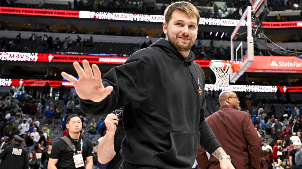 Apr 7, 2023; Dallas, Texas, USA; Dallas Mavericks guard Luka Doncic (77) waves to the crowd as he walks off the court after the Mavericks loss to the Chicago Bulls at the American Airlines Center. Mandatory Credit: Jerome Miron-USA TODAY Sports