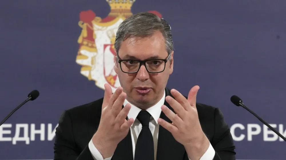 Serbian President Aleksandar Vucic addresses media after shooting in Ribnikar school in Belgrade, Serbia, Wednesday, May 3, 2023. Police say a 13-year-old who opened fire at his school drew sketches of classrooms and made a list of people he intended to target. He killed eight fellow students and a school guard before being arrested Wednesday. (AP Photo/Darko Vojinovic)