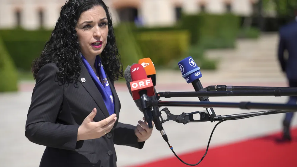 Kosovo's President Vjosa Osmani-Sadriu speaks with the media as she arrives for the European Political Community Summit at the Mimi Castle in Bulboaca, Moldova, Thursday, June 1, 2023. Leaders are meeting in Moldova Thursday for a summit aiming to show a united front in the face of Russia's war in Ukraine and underscore support for the Eastern European country's ambitions to draw closer to the West and keep Moscow at bay. (AP Photo/Vadim Ghirda)