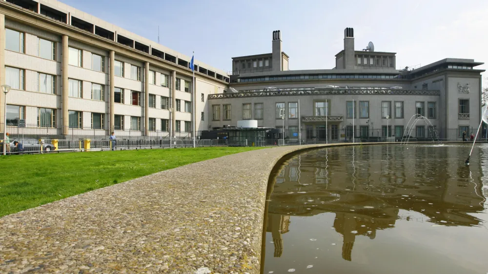 Exterior of the U.N. war crimes tribunal for former Yugoslavia in The Hague, Netherlands, Wednesday, July 30, 2008. The court has announced that former Bosnian Serb leader Radovan Karadzic will be summoned before a judge Thursday afternoon and asked to enter a plea on each of 11 counts, including genocide, extermination and persecution. (AP Photo/ Cris Toala Olivares)