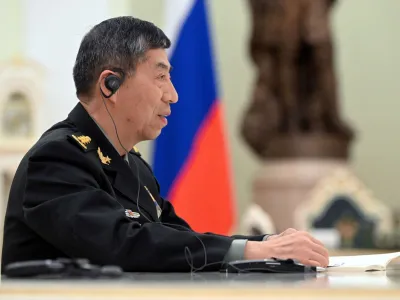 FILE PHOTO: Chinese Defence Minister Li Shangfu attends a meeting with Russian President Vladimir Putin and Defence Minister Sergei Shoigu in Moscow, Russia, April 16, 2023. Sputnik/Pavel Bednyakov/Pool via REUTERS ATTENTION EDITORS - THIS IMAGE WAS PROVIDED BY A THIRD PARTY./File Photo