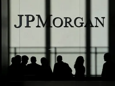 FILE - In this Oct. 21, 2013 file photo, the JPMorgan Chase & Co. logo is displayed at their headquarters in New York. JPMorgan Chase announced a settlement with the sex victims of financier Jeffrey Epstein, the bank said Monday, June 12, 2023, which had accused the bank of being the financial conduit that Epstein used to pay off his victims for several years. (AP Photo/Seth Wenig, File)