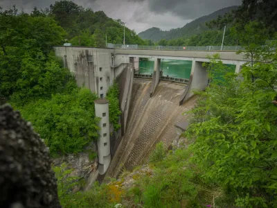 Small but steep dam for hydroelectric plant in Moste, Slovenia. View of the hidroelectric dam from above, looking down.