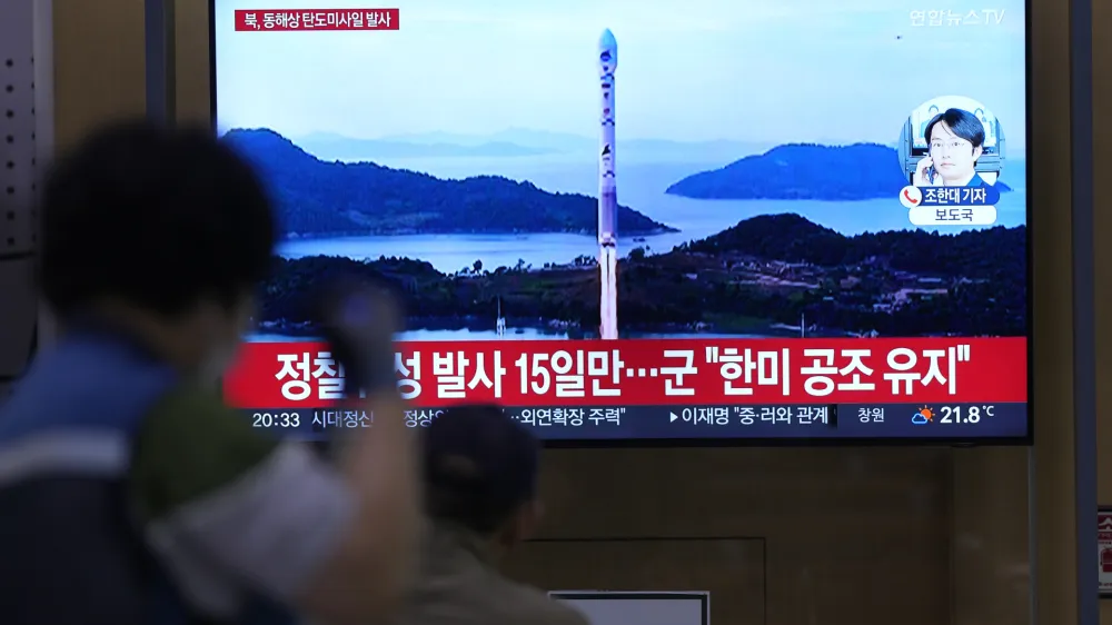 A TV screen shows a report of North Korea's missile launch with file image during a news program at the Seoul Railway Station in Seoul, South Korea, Thursday, June 15, 2023. North Korea test-fired a ballistic missile off its east coast on Thursday, hours after South Korean and U.S. troops ended a fifth round of large-scale live-fire drills near the Koreas' heavily fortified border. The letters read " North Korea, launched ballistic missile to east coast." (AP Photo/Lee Jin-man)