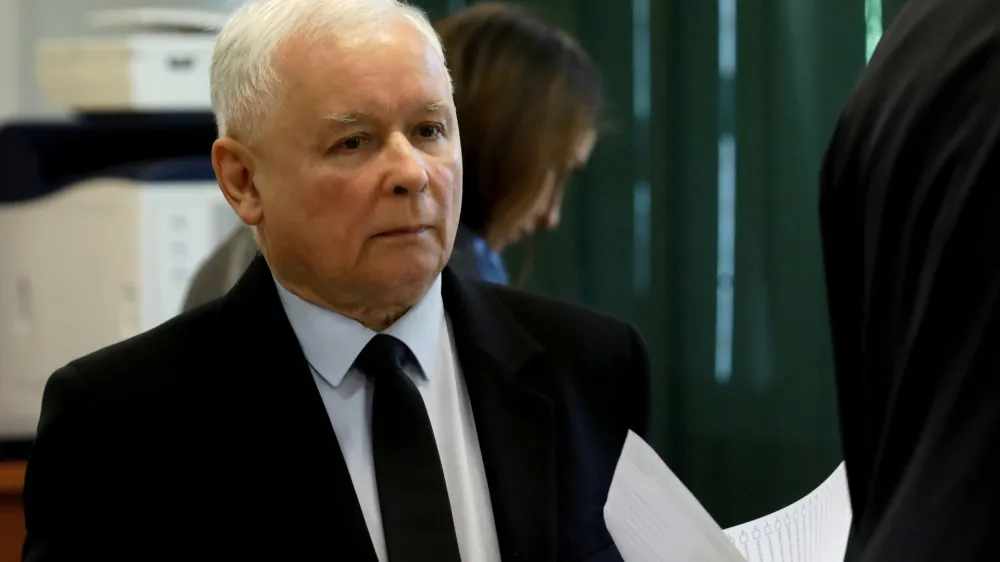 ﻿FILE PHOTO: Jaroslaw Kaczynski, leader of the ruling Law and Justice (PiS) party, attends a vote during parliamentary elections at a polling station in Warsaw, Poland, October 13, 2019. REUTERS/Kacper Pempel/File Photo