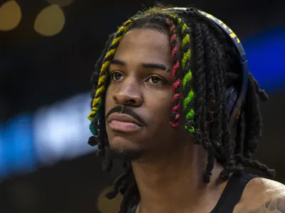 FILE - Memphis Grizzlies guard Ja Morant warms up before an NBA basketball game against the Houston Rockets, Wednesday, March 22, 2023, in Memphis, Tenn. Morant has been suspended for the first 25 games of the upcoming season for his second known incident of displaying what appeared to be a firearm on social media, the NBA announced Friday, June 16, 2023. (AP Photo/Brandon Dill, File)