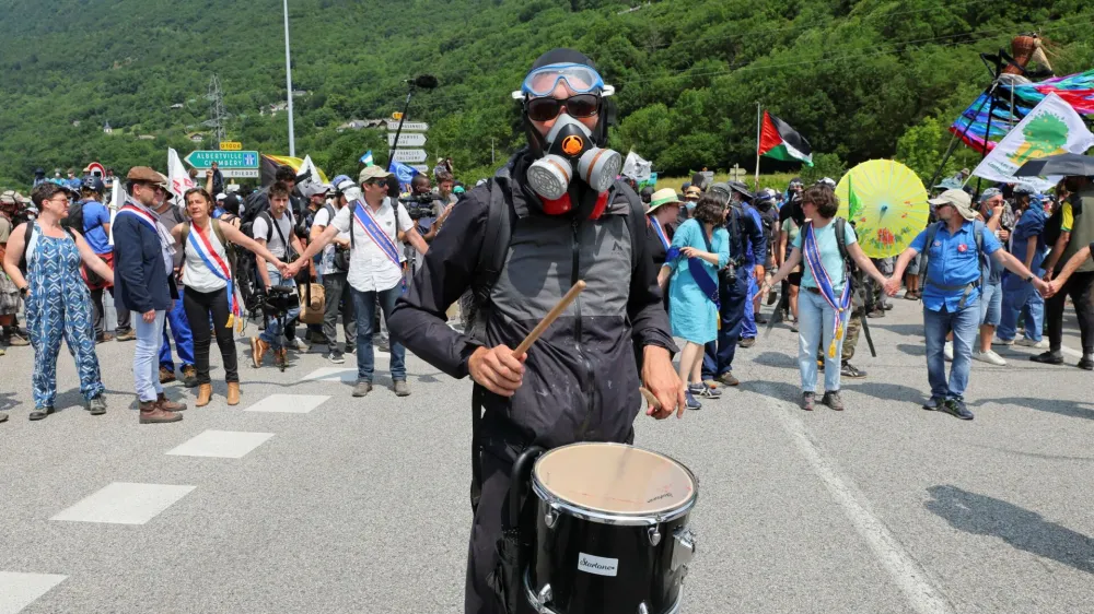 Activists take part in a protest against the Lyon-Turin rail link between France and Italy, near Saint-Jean-de-Maurienne, France, June 17, 2023. REUTERS/Denis Balibouse