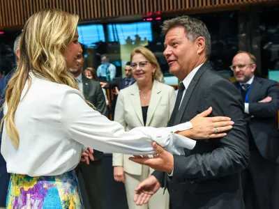 HANDOUT - 19 June 2023, Luxembourg: German Minister for Economic Affairs and Climate Action (2nd R) talks with Swedish Minister for Energy, Business and Industry Ebba Busch (L) during the EU Energy Ministers meeting in Luxembourg. Photo: -/EU Council/dpa - ATTENTION: editorial use only and only if the credit mentioned above is referenced in full