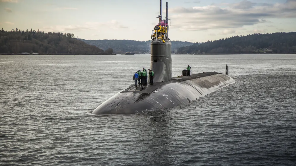 FILE - In this Dec. 15, 2016, photo provided by the U.S. Navy, the Seawolf-class fast-attack submarine USS Connecticut (SSN 22) departs Puget Sound Naval Shipyard in Bremerton, Wash., for sea trials following a maintenance availability. The vessel that went missing Sunday, June 18, 2023, in the North Atlantic while exploring the Titanic is not a submarine, it's a submersible. The National Oceanic and Atmospheric Administration says a submarine has enough power to leave port and come back to port under its own power while a submersible is not autonomous. (Thiep Van Nguyen II/U.S. Navy via AP, File)