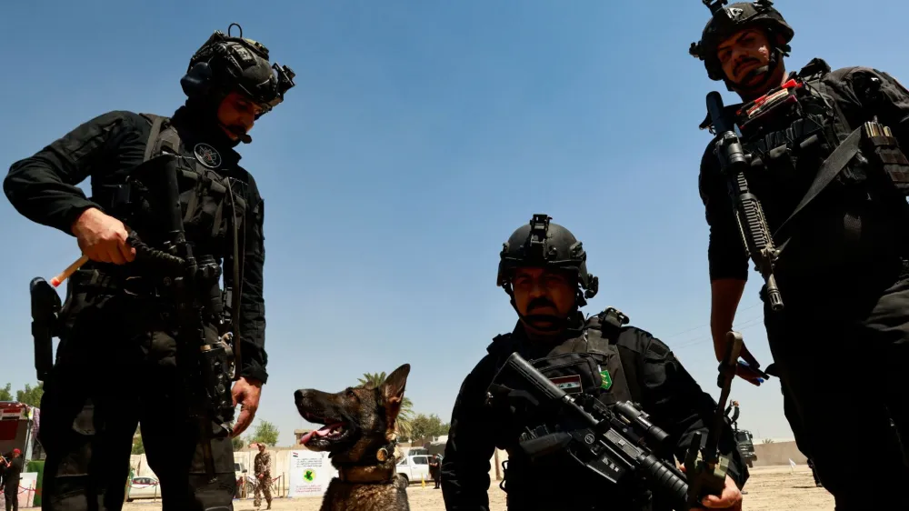 Iraqi Counter-Terrorism Service (ICTS) members take part in the tactical exercise (Iron fist) in Baghdad, Iraq, June 21, 2023. REUTERS/Thaier Al-Sudani