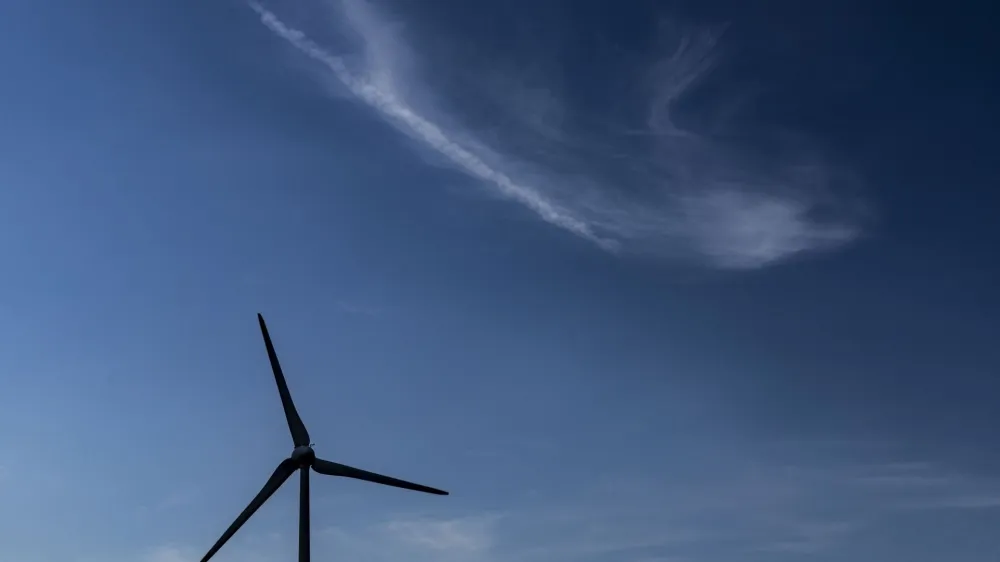 A windmill turbine is pictured in Dorenaz, Switzerland, August 29, 2022. REUTERS/Denis Balibouse